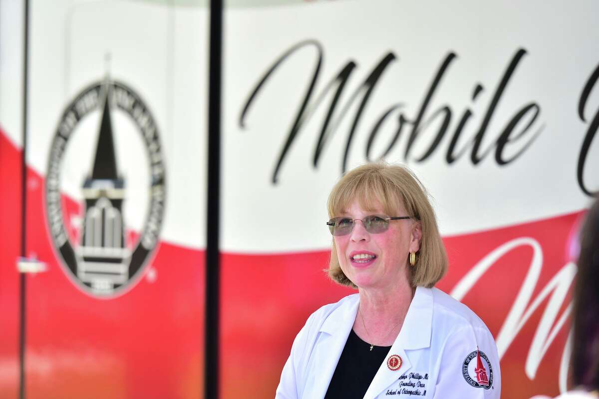 Dr. Robyn Phillips-Madson, dean of UIW’s School of Osteopathic Medicine, speaks during the unveiling of the school’s first Mobile Osteopathic Medicine unit.