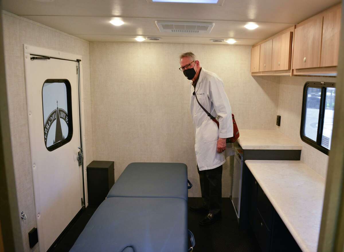 Dr. John Seidenfeld tours the exam area of UIW’s mobile clinic Saturday.