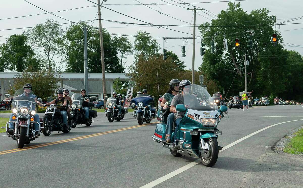Riders filter in from 9L North to Adirondack Bar & Grill in Lake George, N.Y., following a ride for charity, the Make A Wish Foundation, on Saturday, Jul. 24, 2021. More than 300 motorcyclists registered for the event. (Jenn March, Special to the Times Union)