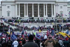 In this Jan. 6, 2021 file photo, violent insurrectionists loyal to President Donald Trump storm the U.S. Capitol in Washington. (AP Photo/Jose Luis Magana, File)