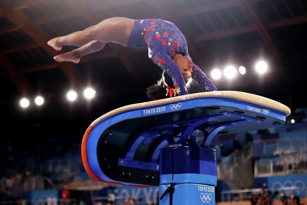 TOKYO, JAPAN - JULY 25: Simone Biles of Team United States competes on vault during Women's Qualification on day two of the Tokyo 2020 Olympic Games at Ariake Gymnastics Centre on July 25, 2021 in Tokyo, Japan. (Photo by Laurence Griffiths/Getty Images)