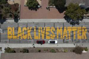 Two arrested on suspicion of vandalizing Black Lives Matter street mural in Santa Cruz