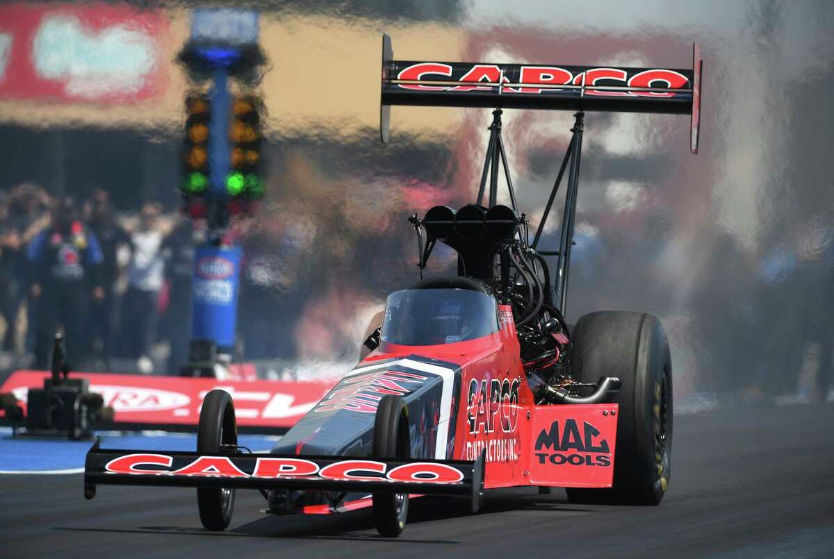 In this photo provided by the NHRA, Steve Torrence continued his dominance in the Top Fuel ranks as he picked up the win at Sonoma Raceway when we went 3.757 seconds at 327.98 mph to defeat Leah Pruett in the final round, Sunday, July 25, 2021 in Sonoma, Calif. He is now the only NHRA driver with the chance to sweep the 2021 Western Swing as the tour continues to Pomona next week. (Marc Gewertz/NHRA via AP)