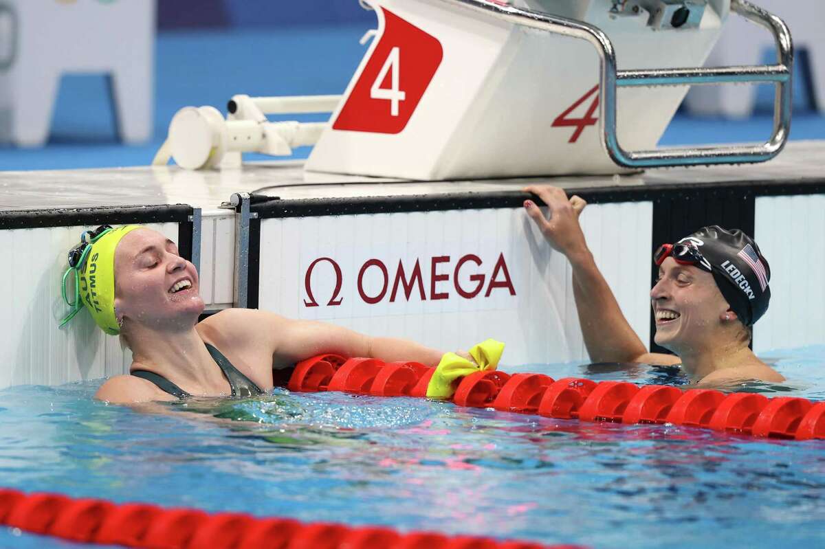 TOKYO, JAPAN - JULY 26: Ariarne Titmus of Team Australia and Katie Ledecky of Team United States react after competing in the Women's 400m Freestyle Final on day three of the Tokyo 2020 Olympic Games at Tokyo Aquatics Centre on July 26, 2021 in Tokyo, Japan. (Photo by Clive Rose/Getty Images)