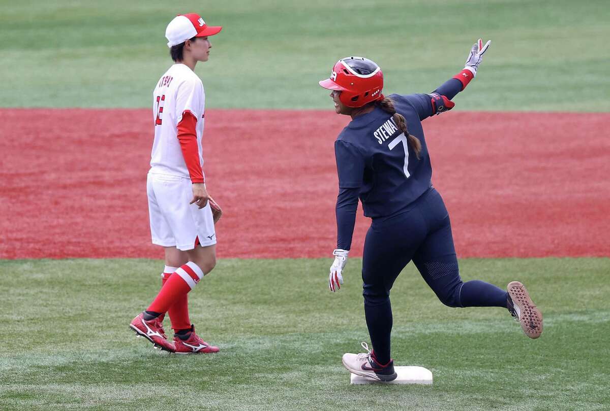 Kelsey Stewart of the U.S. rounds second after her walk-off home run to beat Japan 2-1 to finish group play in softball.