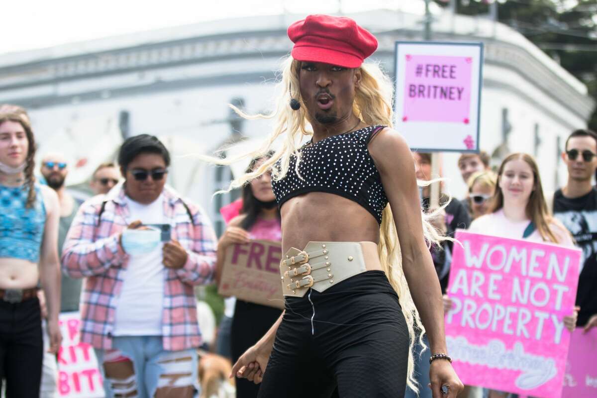 Drag performer Iman, Center, performs at a Free Britney rally on Market and Castro streets in San Francisco on July 25, 2021.  The Free Britney Movement seeks to end Britney Spears Conservatories and raise awareness of Conservatory abuse.