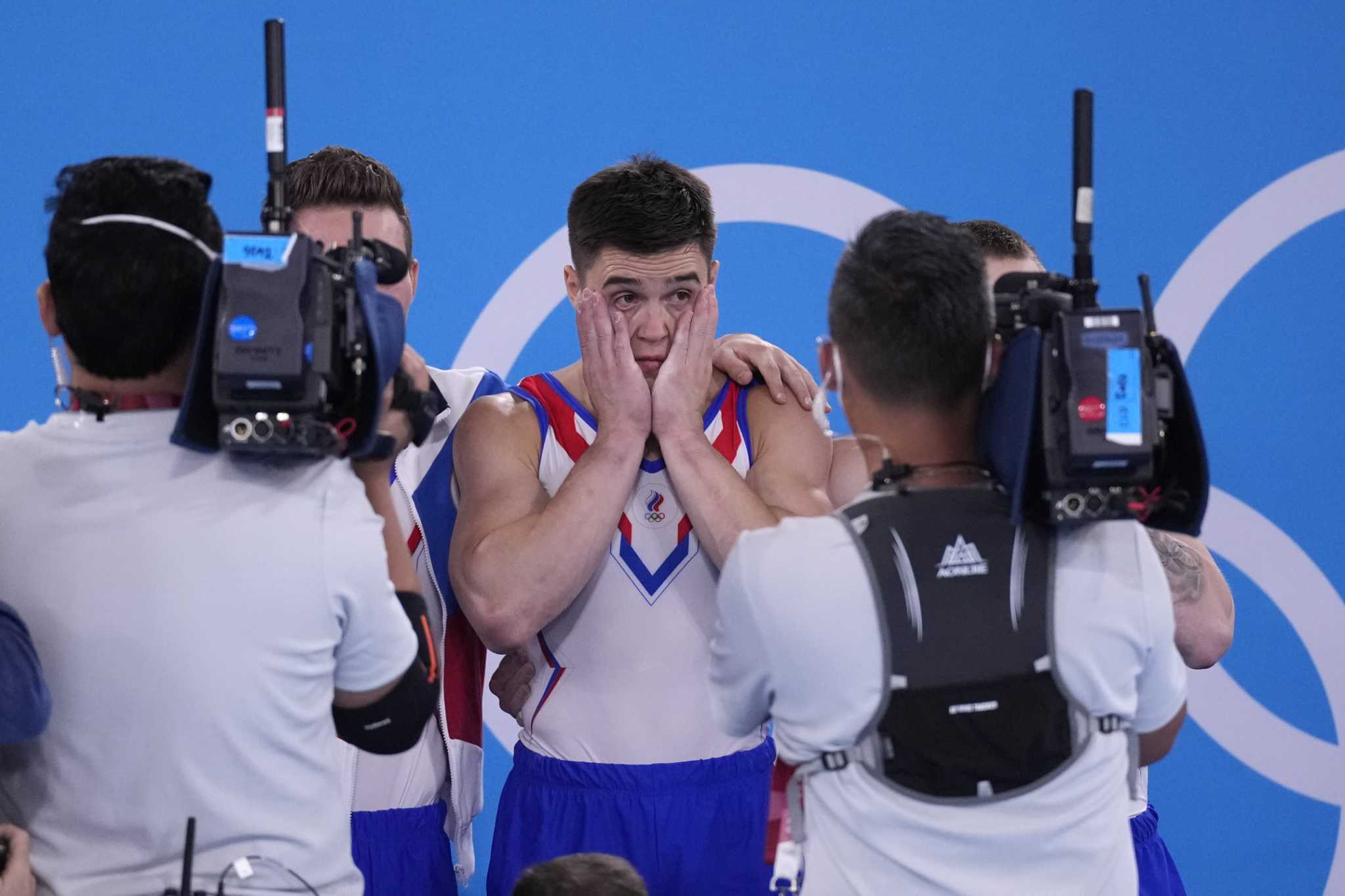 tv-station-apologizes-for-inexcusable-photos-on-olympic-broadcast