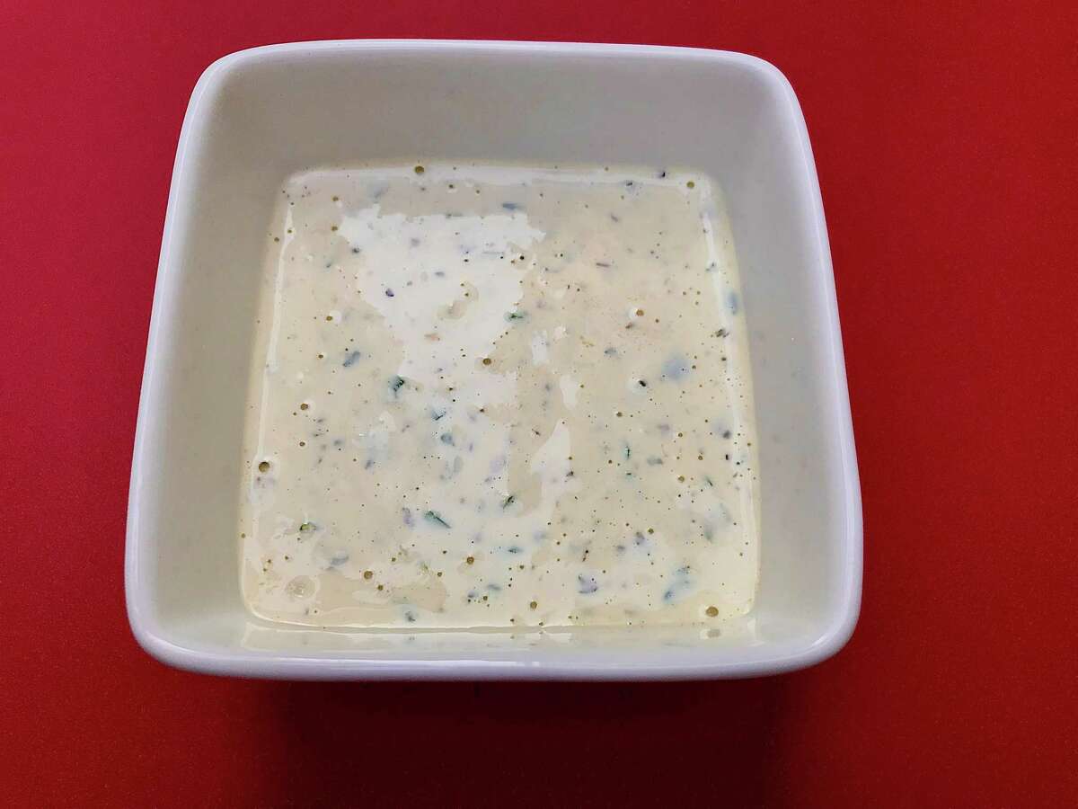 Creamy Italian Dressing uses mayonnaise and sour cream to add body to merger of red wine vinegar and olive oil.