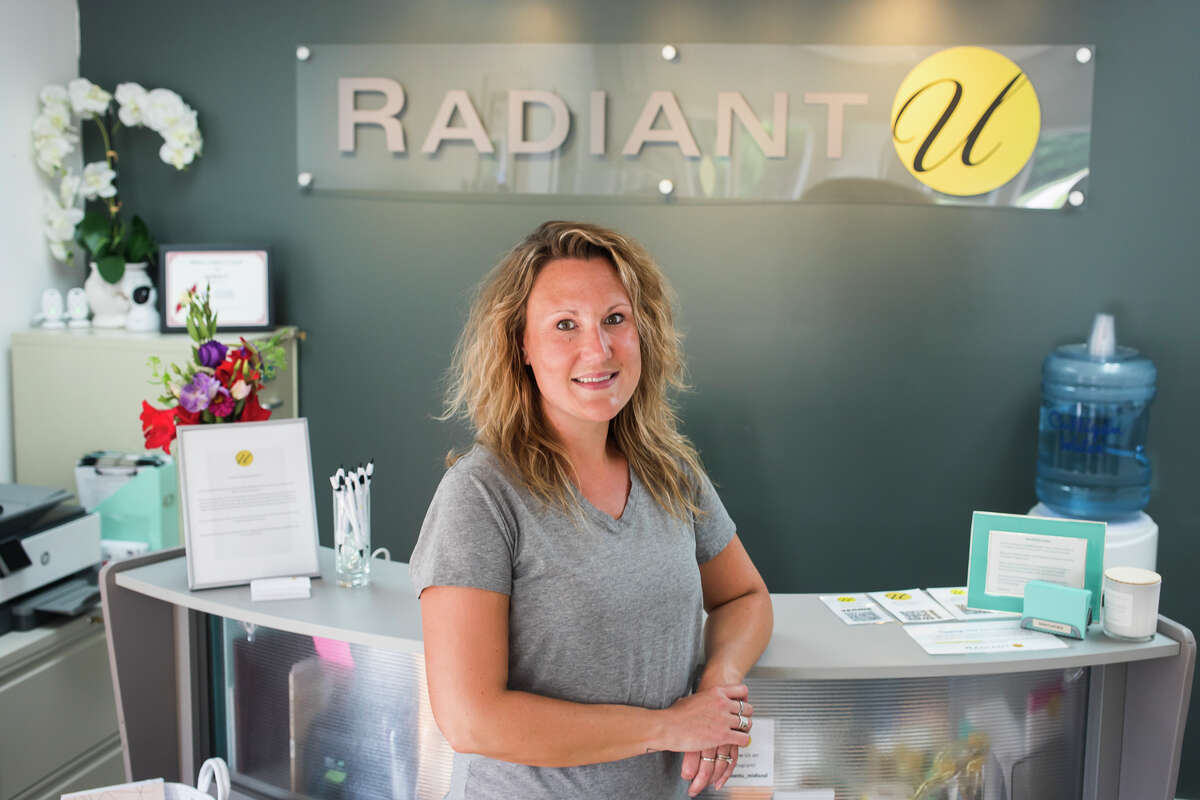 Radiant U Owner Amy Vargo poses for a portrait Monday inside the skin treatment center, located at 2906 N. Saginaw Road in Midland. (Katy Kildee/kkildee@mdn.net)