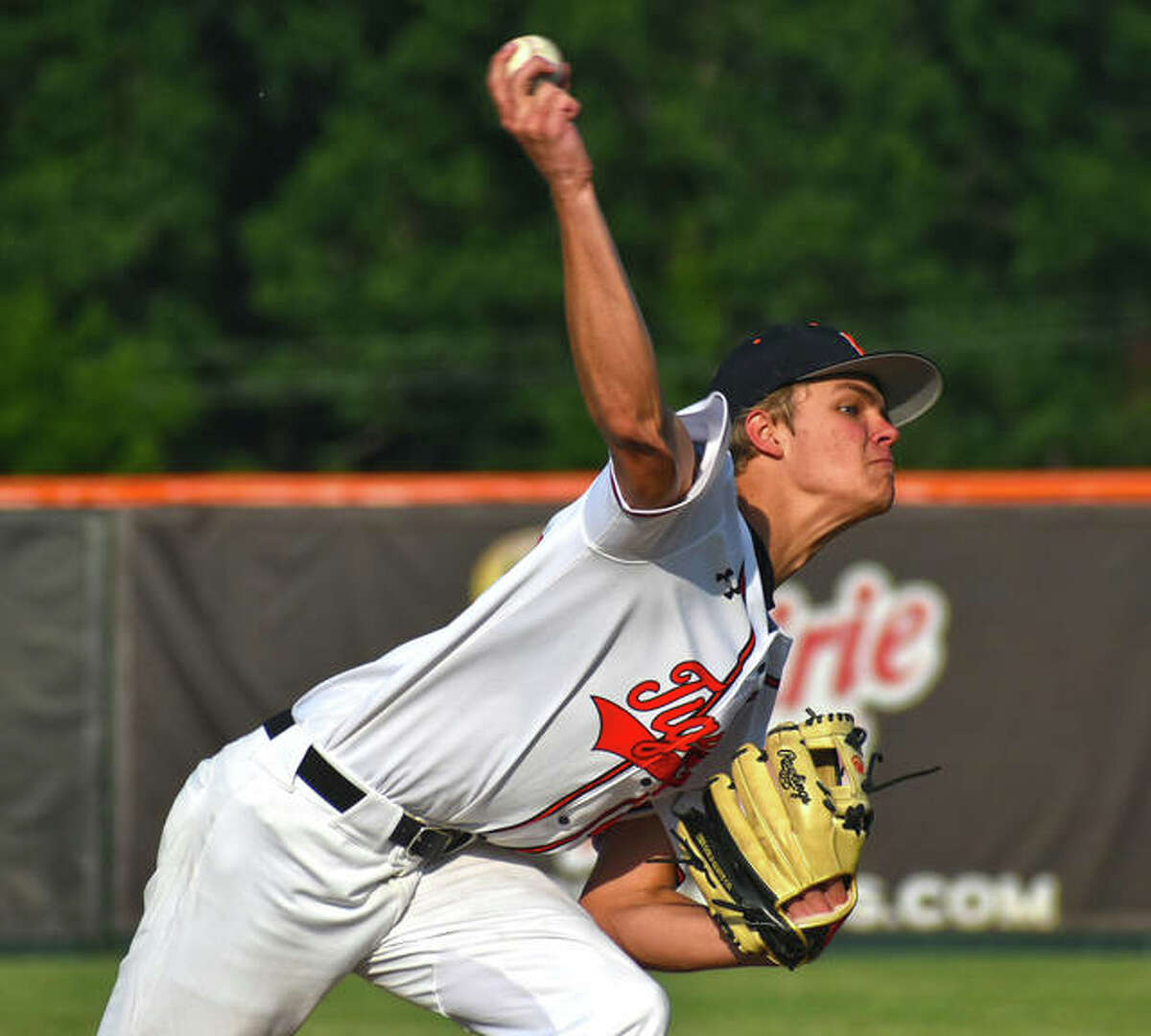 Edwardsville senior Quinn Weber fires a pitch to a Collinsville hitter during the postseason opener at Tom Pile Field.