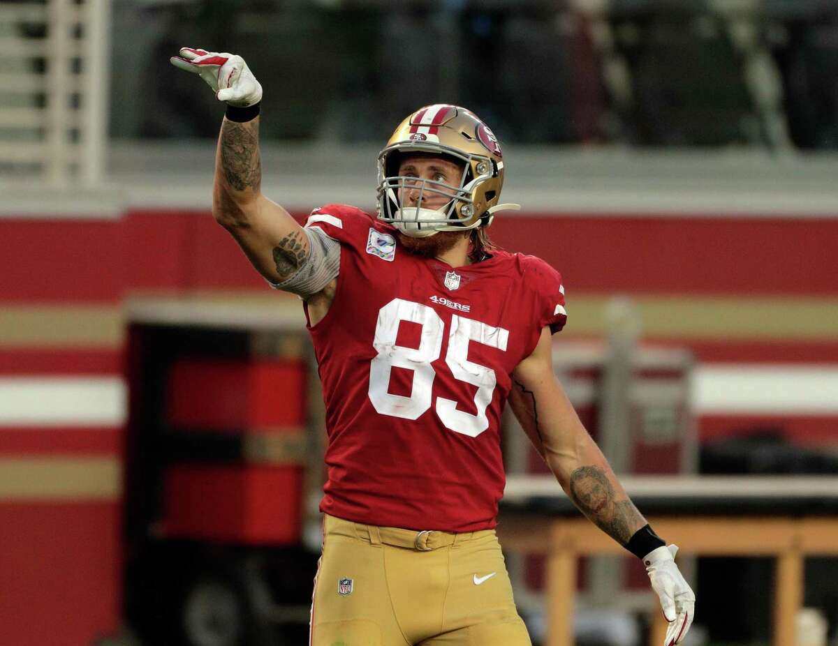 George Kittle (85) gestures for a first down after a 38-yard reception In the first half as the San Francisco 49ers played the Philadelphia Eagles at Levi’s Stadium in Santa Clara, Calif., on Sunday, October 4, 2020.