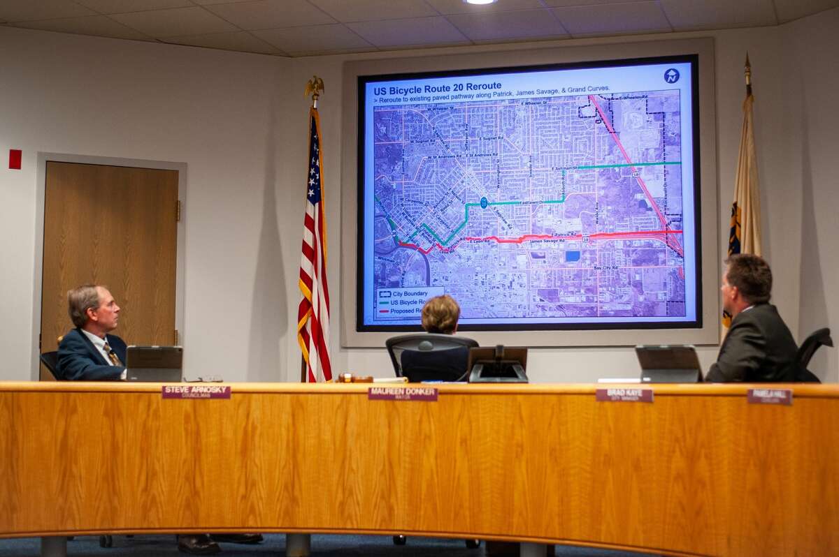 Midland city council members watch a presentation about a proposed bicycle route change on July 26, 2021 in Midland City Hall.