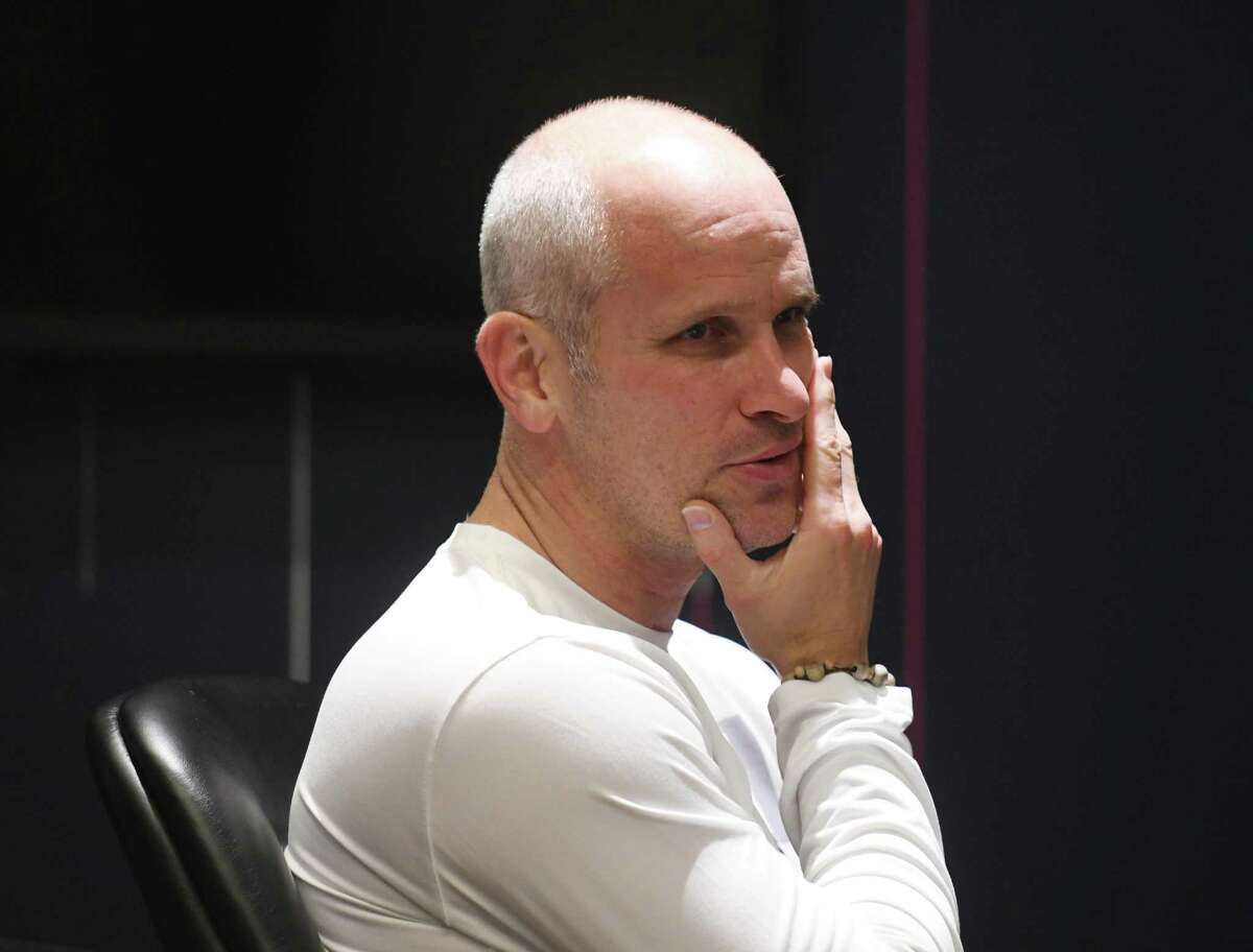 UConn men's basketball coach Dan Hurley leads a meeting with assistant coaches before practice at the Werth Family UConn Basketball Champions Center on the UConn main campus in Storrs, Conn. Wednesday, June 9, 2021.