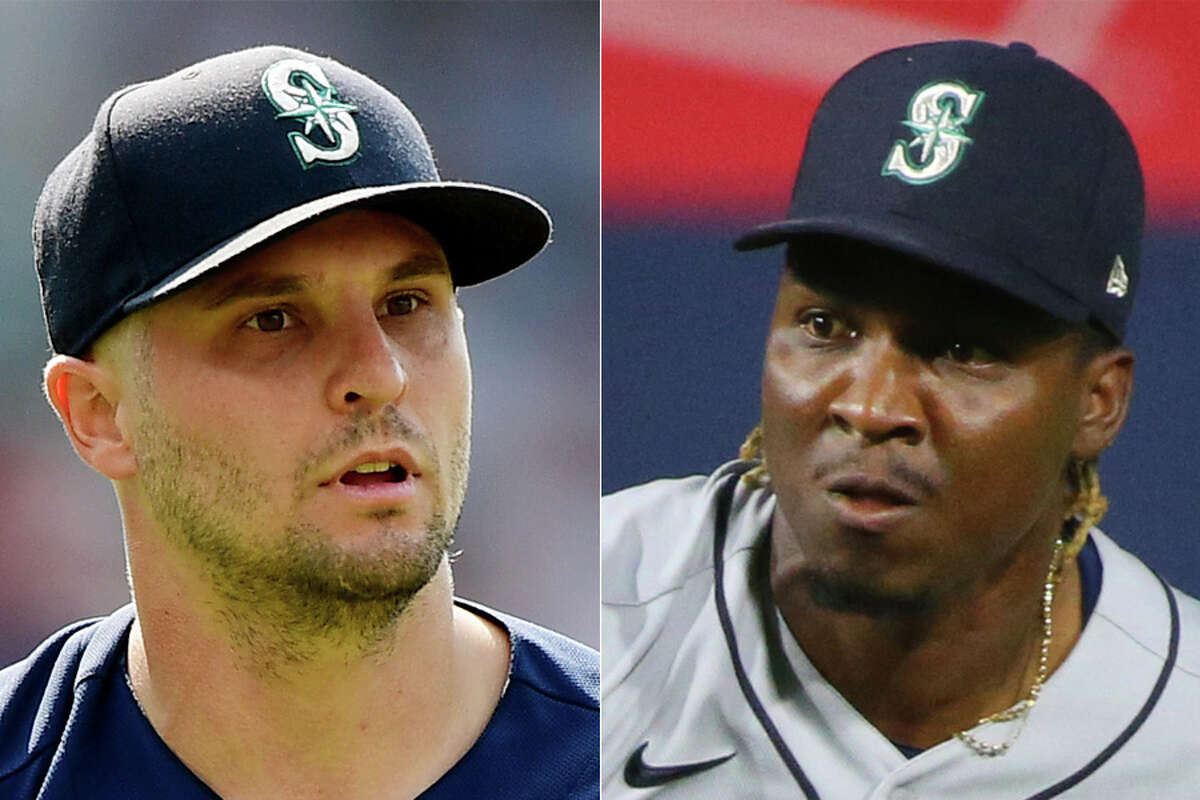 Kendall Graveman (left) and Rafael Montero are changing clubhouses after being acquired by the Astros from the Mariners before their game Tuesday in Seattle.