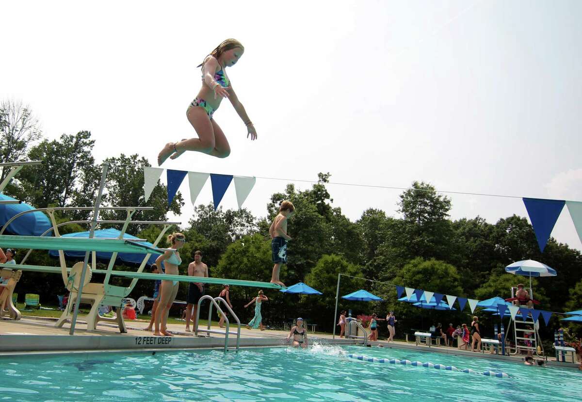 In photos: A hot summer’s day in the water in New Canaan