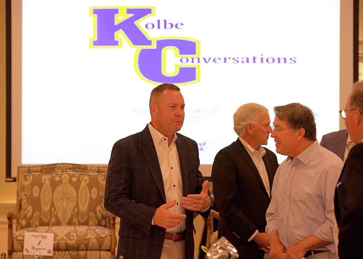 New USGA CEO Mike Whan chats with a guest at the Kolbe Conversations "Let's Talk Golf" held Tuesday at the Patterson Club in Fairfield.