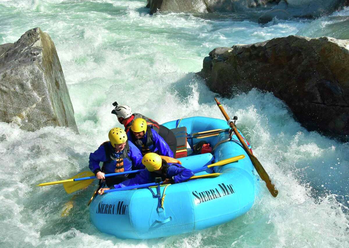 Rafters take advantage of the Tuolumne River rapids. Outfitters are able to keep operations running during such a dry year with the help of water agencies.