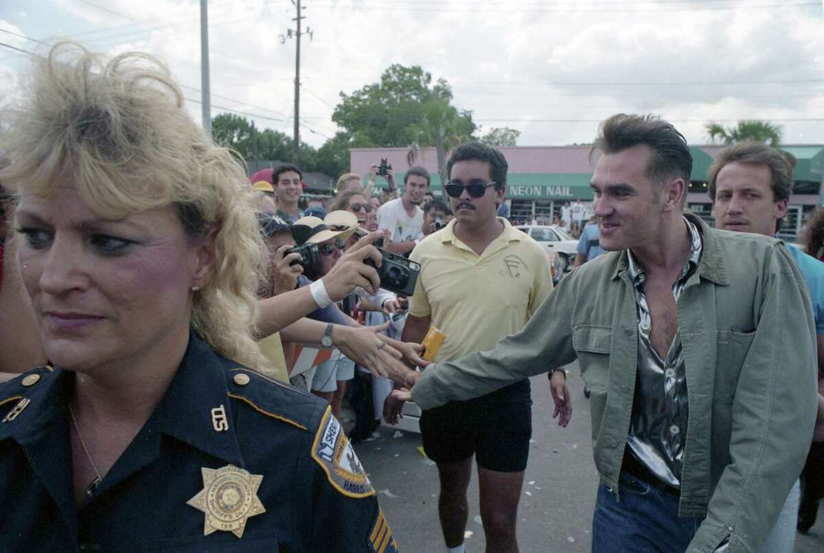 Morrissey arrives at Record Rack, 3109 South Shepherd, July 29 1992.