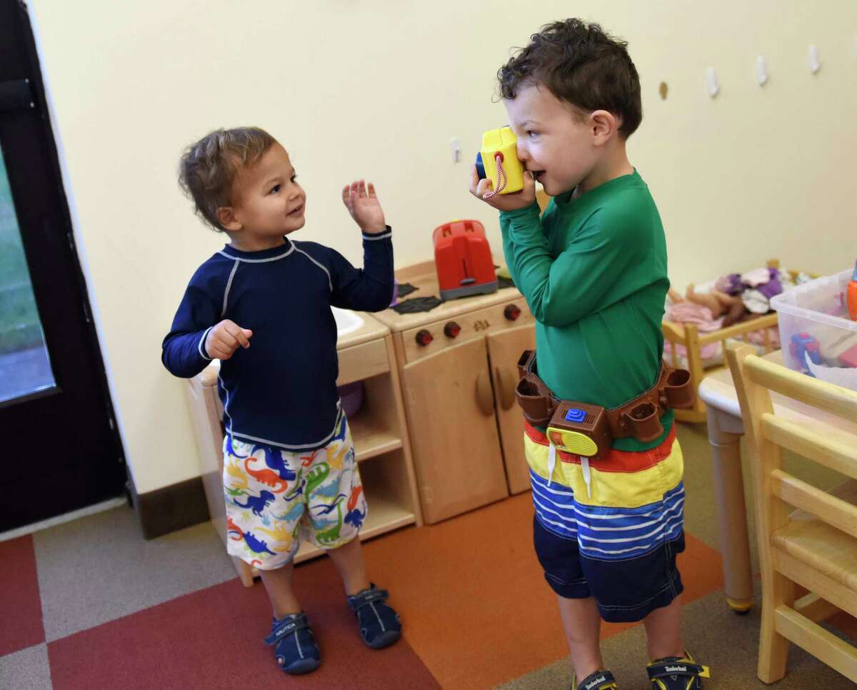 Students play and learn at Temple Sholom's Selma Maisel Nursery School in Greenwich, Conn. Wednesday, July 28, 2021. Even before COVID-19 hit, quality day care centers were in high demand. Now, with parents returning to work, it has been difficult for many to find childcare openings in the area.