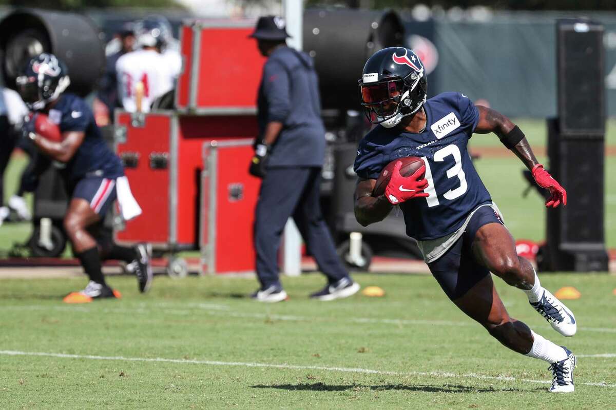 Houston Texans wide receiver Brandin Cooks turns the ball up the field after making a catch during an NFL training camp football practice Wednesday, July 28, 2021, in Houston.