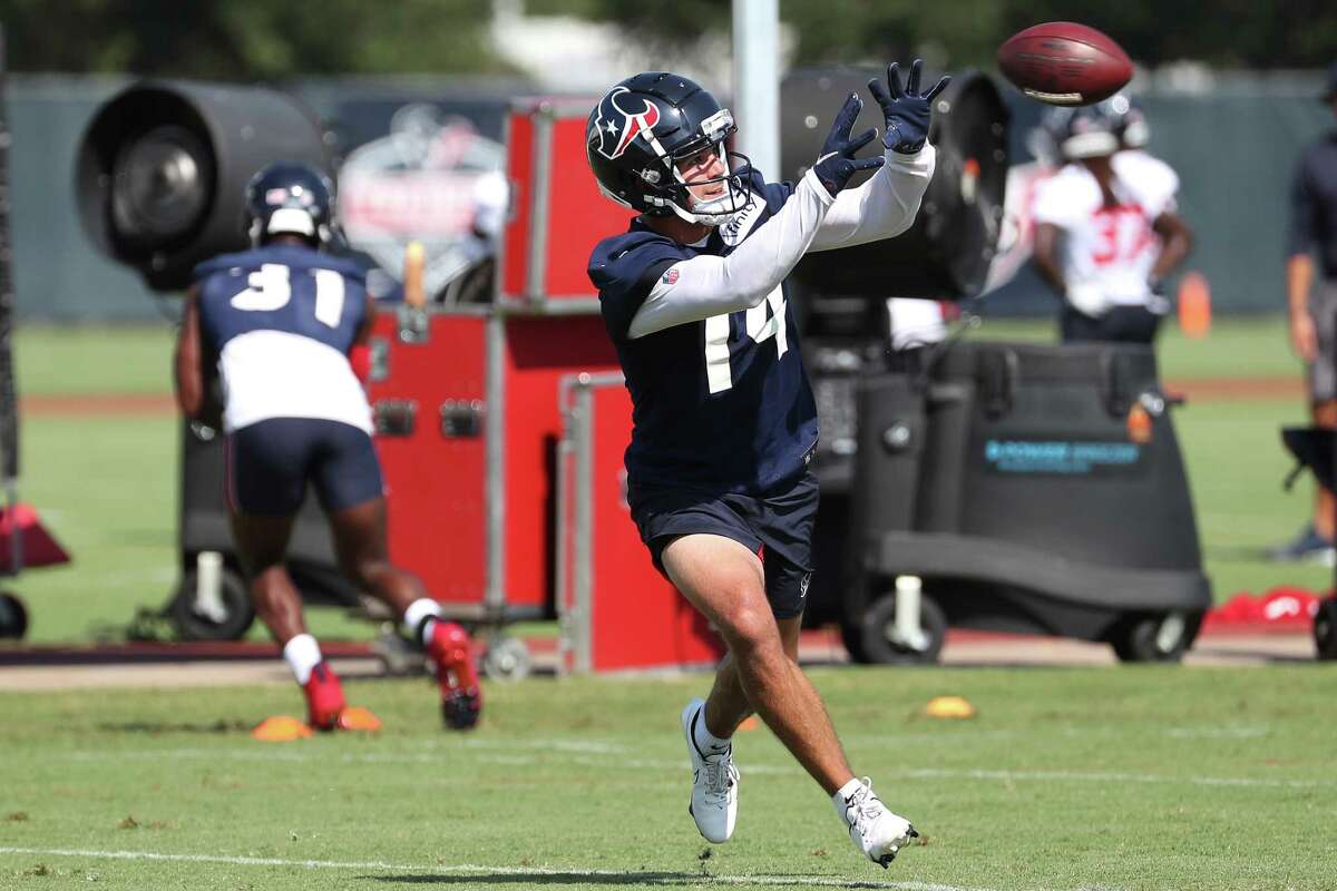 Houston Texans wide receiver Alex Erickson (14) reaches out to make a catch during an NFL training camp football practice Wednesday, July 28, 2021, in Houston.