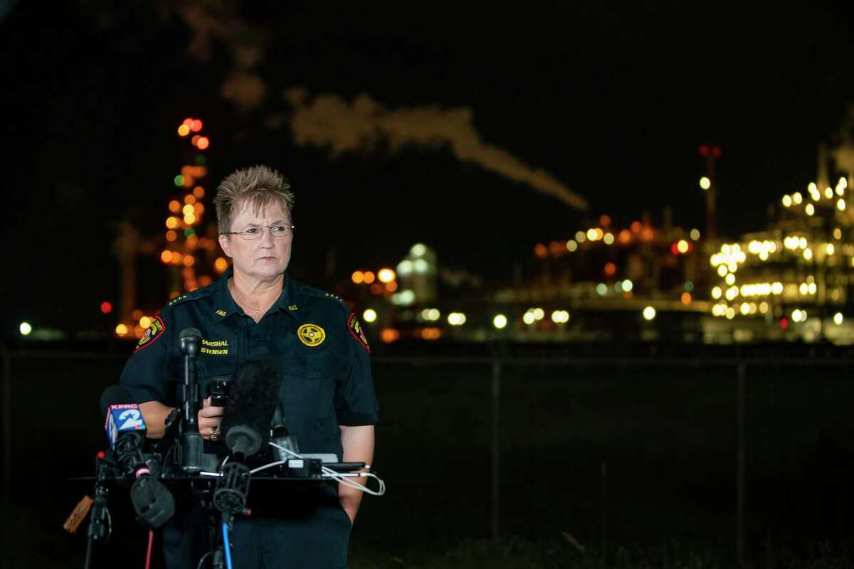 Harris County Fire Marshal Laurie Christensen speaks near the LyondellBasell facility in La Porte off of Miller Cut Off Road, Tuesday, July 27, 2021. An explosion Tuesday evening killed two people at the facility and left several others injured according Christensen.
