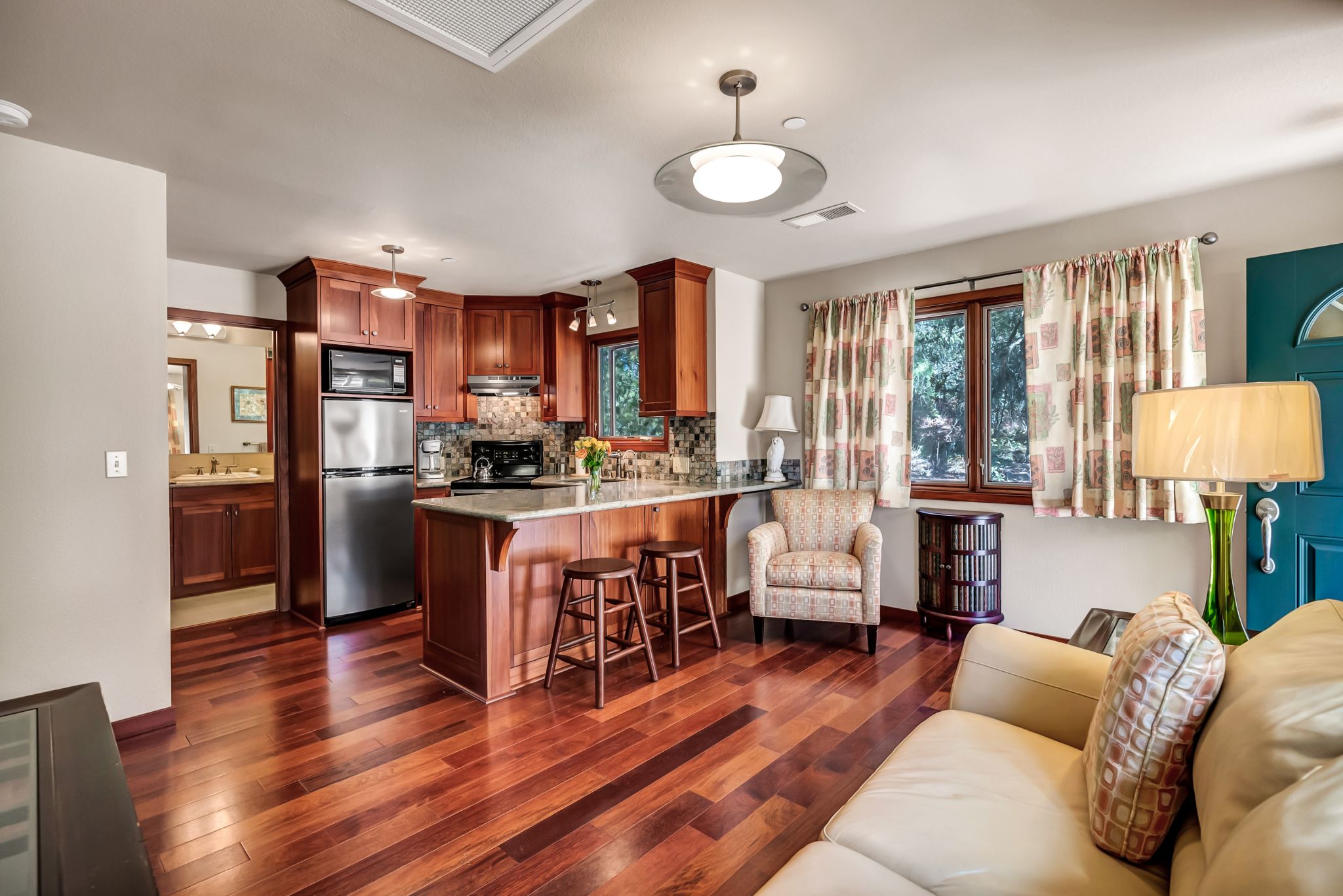Inside the ADU/guest house is a full kitchen, bed and bath, plus office.