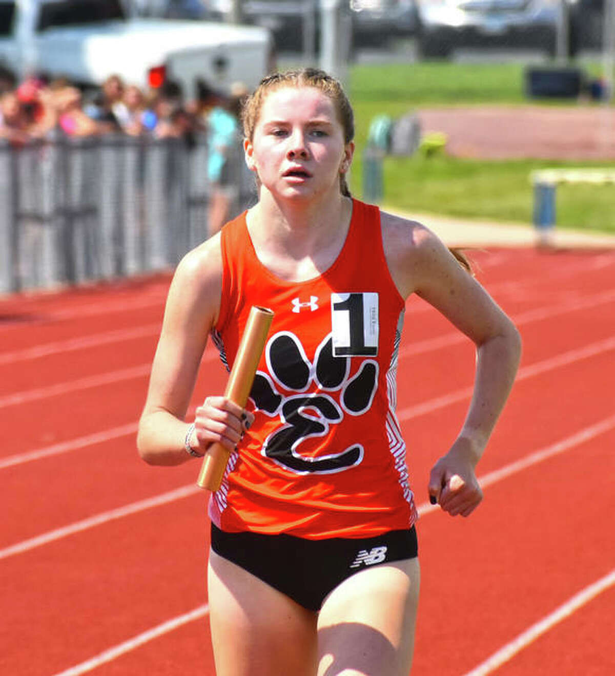 In this file photo, Edwardsville’s Riley Knoyle finishes off the win in the 3,200-meter relay at the Class 3A O’Fallon Sectional last year.