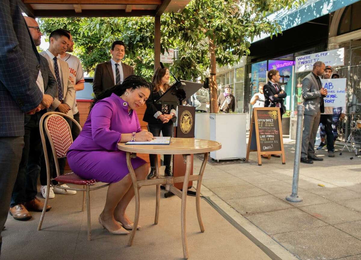 San Francisco Mayor London Breed signs legislation to makes the city's parklets permanent in a ceremony at the parklet outside Etcetera Wine Bar in the Mission.