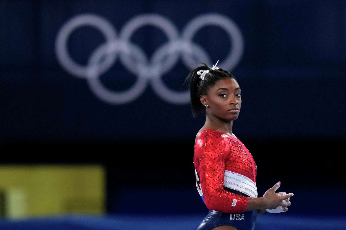 This July 27, 2021, file photo shows Simone Biles, of the United States, waiting to perform on the vault during the artistic gymnastics women's final at the 2020 Summer Olympics, Tuesday, July 27, 2021, in Tokyo.