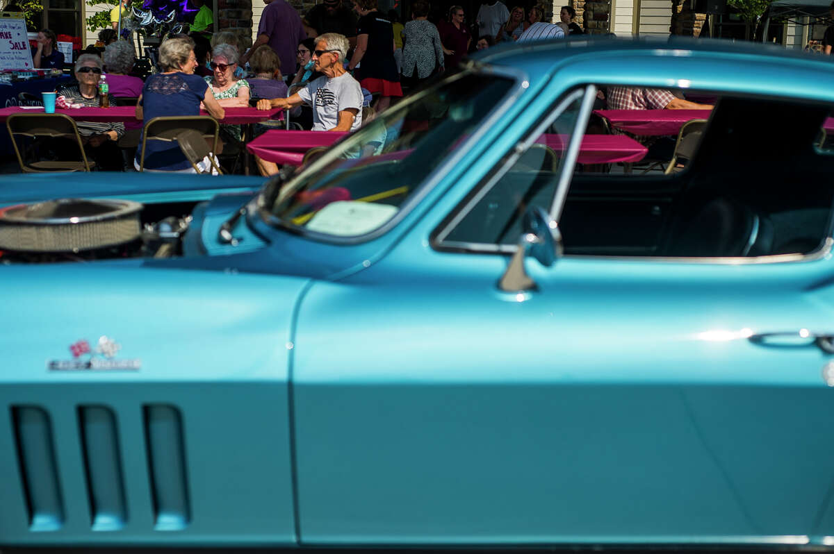 Residents of Primrose Retirement Community of Midland attend their second annual classic car show Wednesday, July 28, 2021 at the facility in Midland. (Katy Kildee/kkildee@mdn.net)