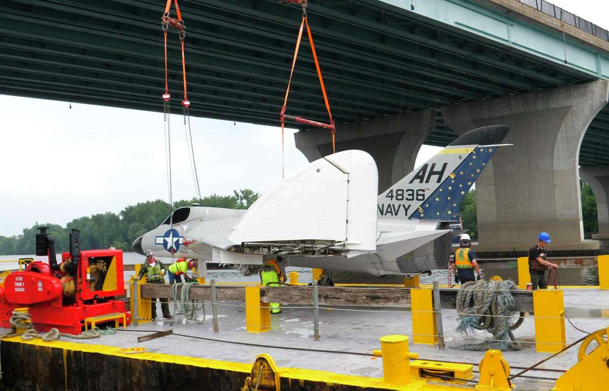 The Douglas F4D Skycraft was loaded onto a barge in Hartford to begin its three day journey to the Intrepid Museum. It passed many Connecticut towns as it traveled down the Connecticut River, through the Long Island Sound, arriving in New York City Tuesday.