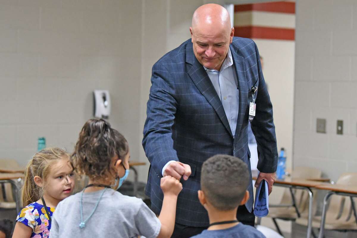 Cy-Fair ISD Superintendent Mark Henry visits with students in school over the summer.