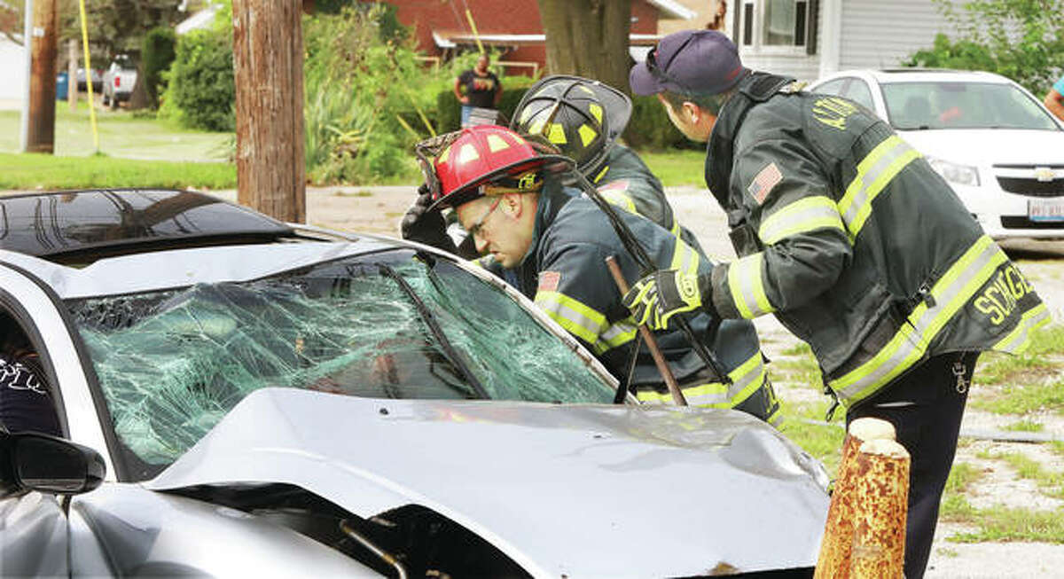 Alton firefighters were called to the scene of an accident about 2:25 p.m. Thursday in the 1100 block of Milton Road. Firefighters had to use a hydraulic rescue tool to open the driver’s side door of a silver Mitsubishi Eclipse, which was occupied by a male driver who appeared to be in his 20s.