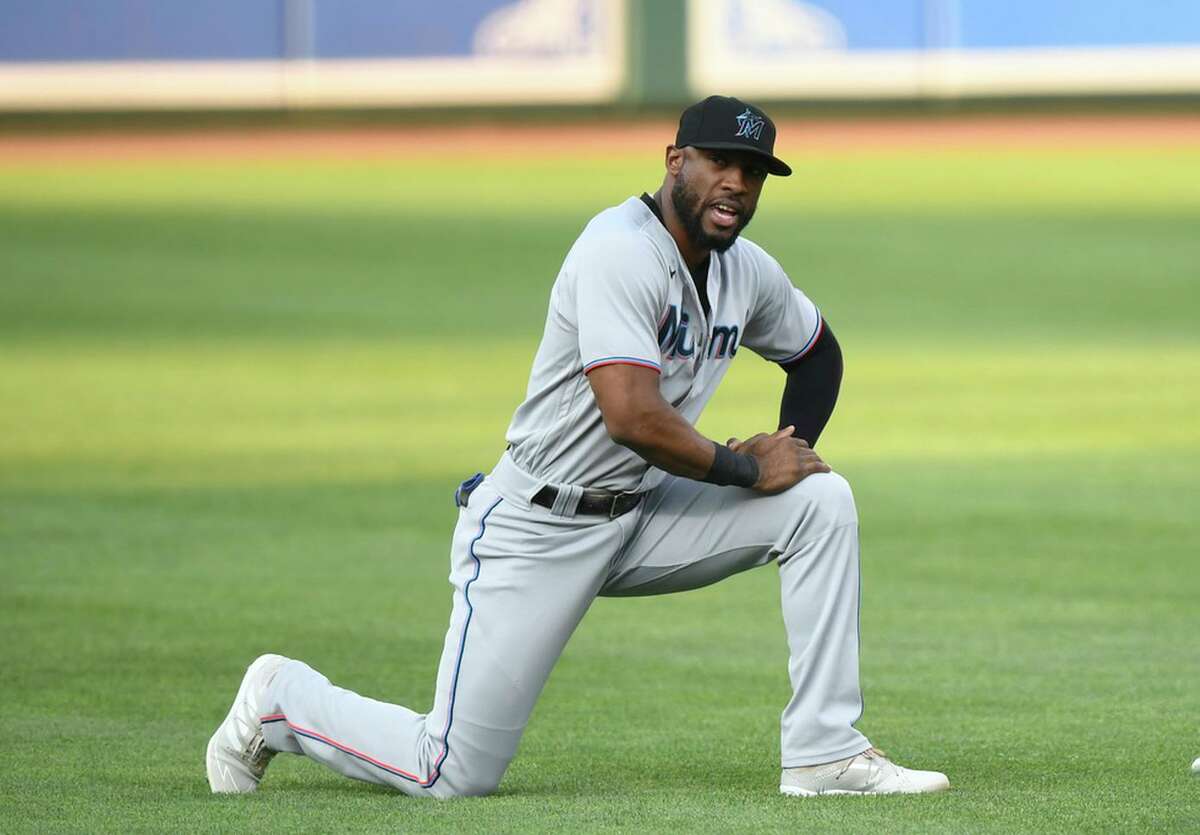 Miami Marlins Starling Marte stretches before a baseball game against the Baltimore OrioleAP Photo/Terrance Williams)