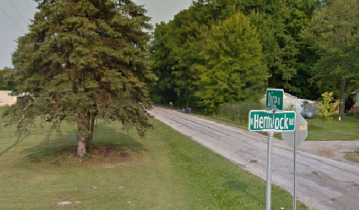 Pictured is the Dice Road sign at the intersection of Hemlock Road.