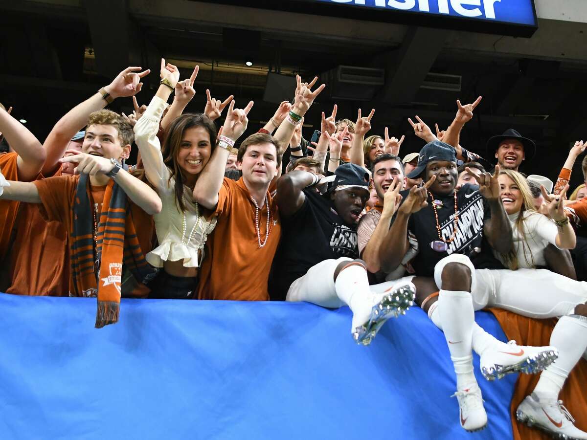 Texas Longhorns fans and players celebrate a win over SEC power Georgia in the 2019 Super Bowl. It was just one of many times the Longhorns thought they were "back."
