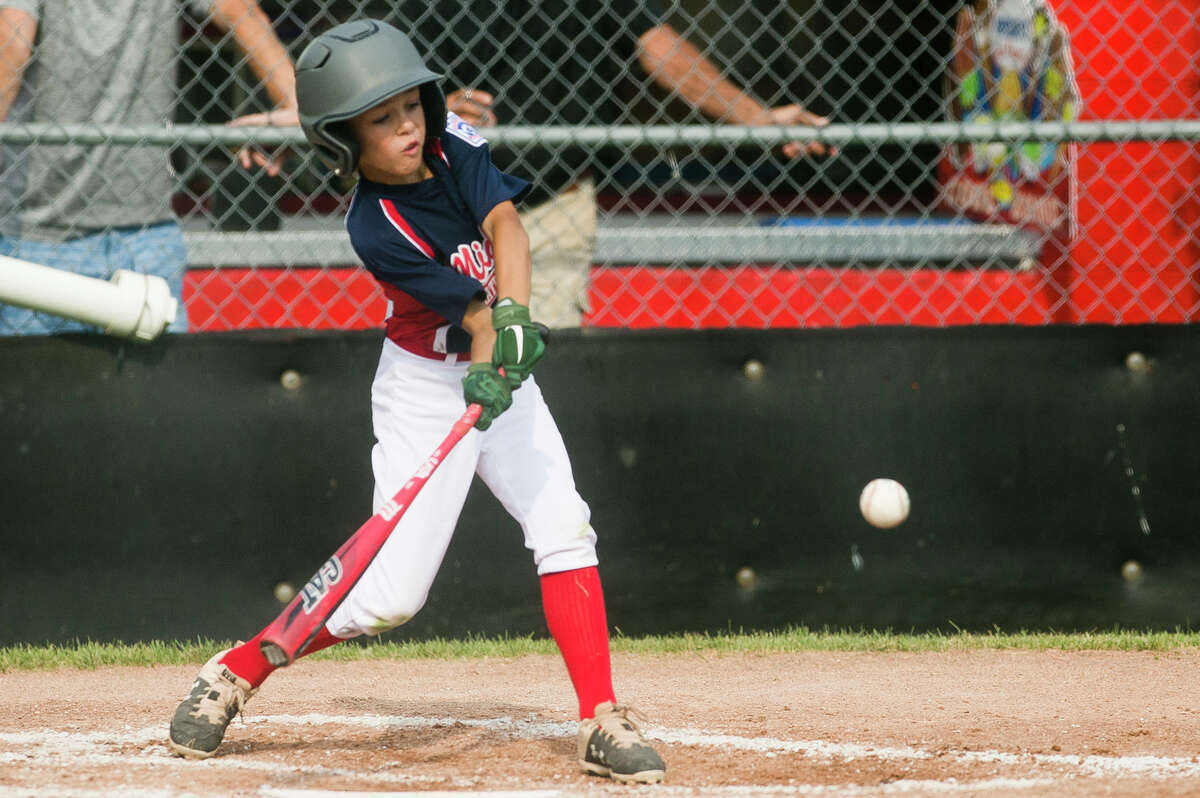 Fraternal Northwest's Peyton Clarke takes a swing during a July 28, 2021 Little League 11U state semifinal vs. Grosse Pointe Farms at Bay City's DeFoe Park. 