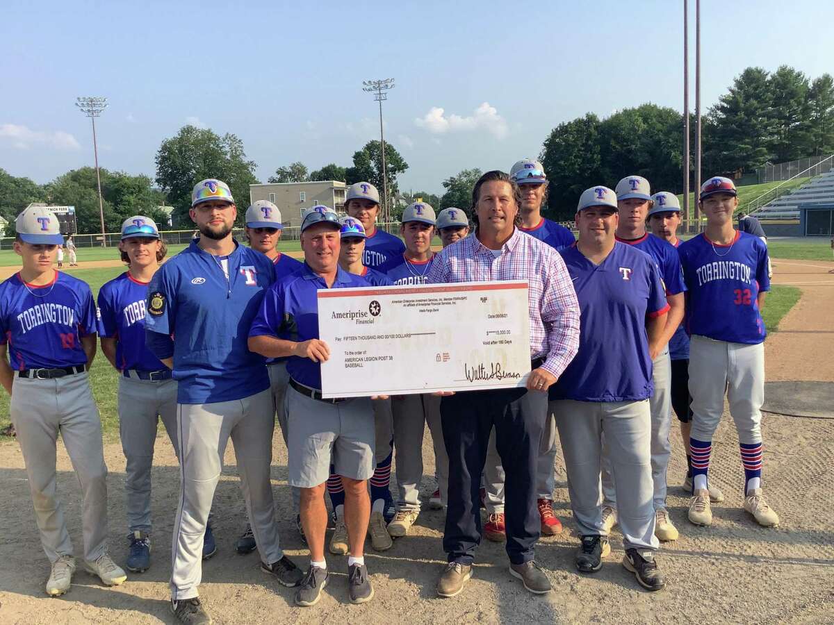 At Fuessenich Park July 27, checks for $15,000 each were presented to representatives from American Legion Baseball, the Torrington Warrior Football program, and Torrington Youth Soccer. Jonathon Root, front right, pictured with American Legion Baseball team members, presented the money to each group on behalf of an anonymous donor.