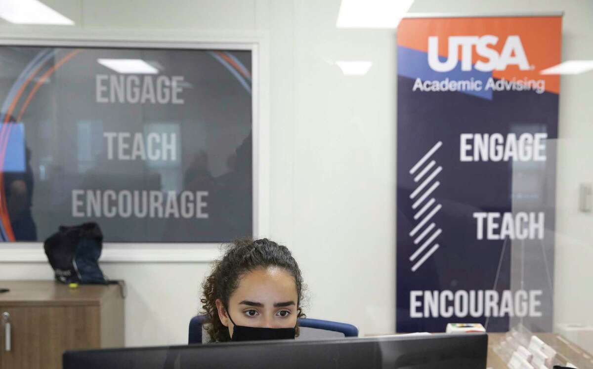 A UTSA staff member is seen Wednesday in the school's new Student Success Center preparing for the start of school. Higher education institutions are increasing resources such as tutoring and advising services to prepare for a freshman class of high school graduates who experienced a year of disruptions and learning losses.