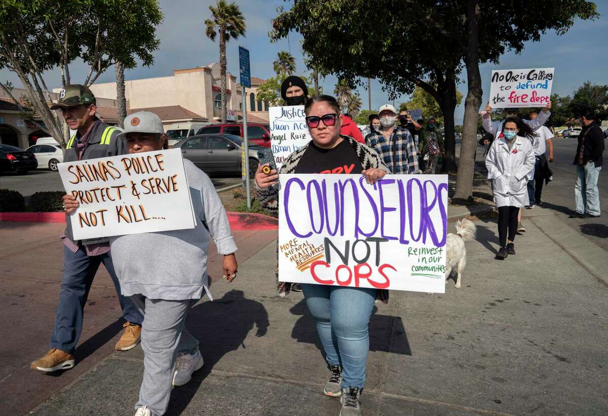 Community members and supporters rally for Gerardo Chavez Martinez as they head toward the Salinas Police Department on Saturday, July 24, 2021 in Salinas, Calif.