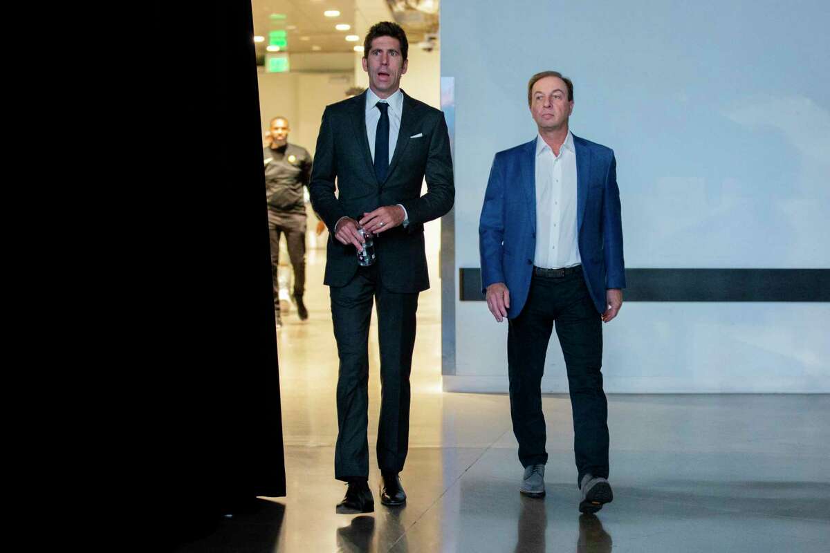 From left: Golden State Warriors general manager Bob Myers and Warriors majority owner Joe Lacob at Chase Center, Friday, July 30, 2021, in San Francisco, Calif. The Warriors selected Jonathan Kuminga (No. 7) and Moses Moody (No. 14) in the NBA Draft on Thursday night.
