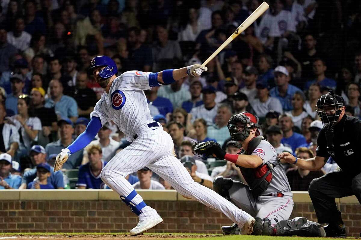 Chicago Cubs' Kris Bryant (17) bats against the Cincinnati Reds in a baseball game, Tuesday, July, 27, 2021, in Chicago. (AP Photo/David Banks)