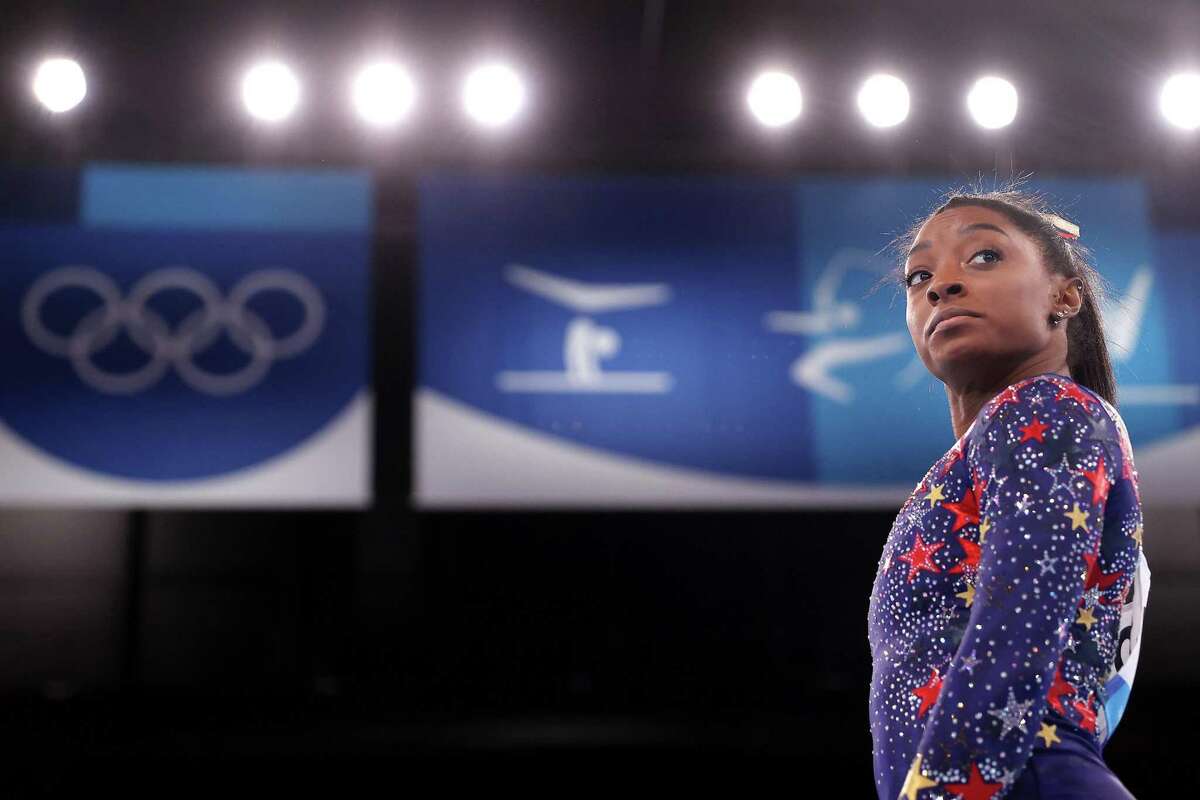 Simone Biles prepares during qualification on day two on Sunday. She withdrew from the team competition two days later.