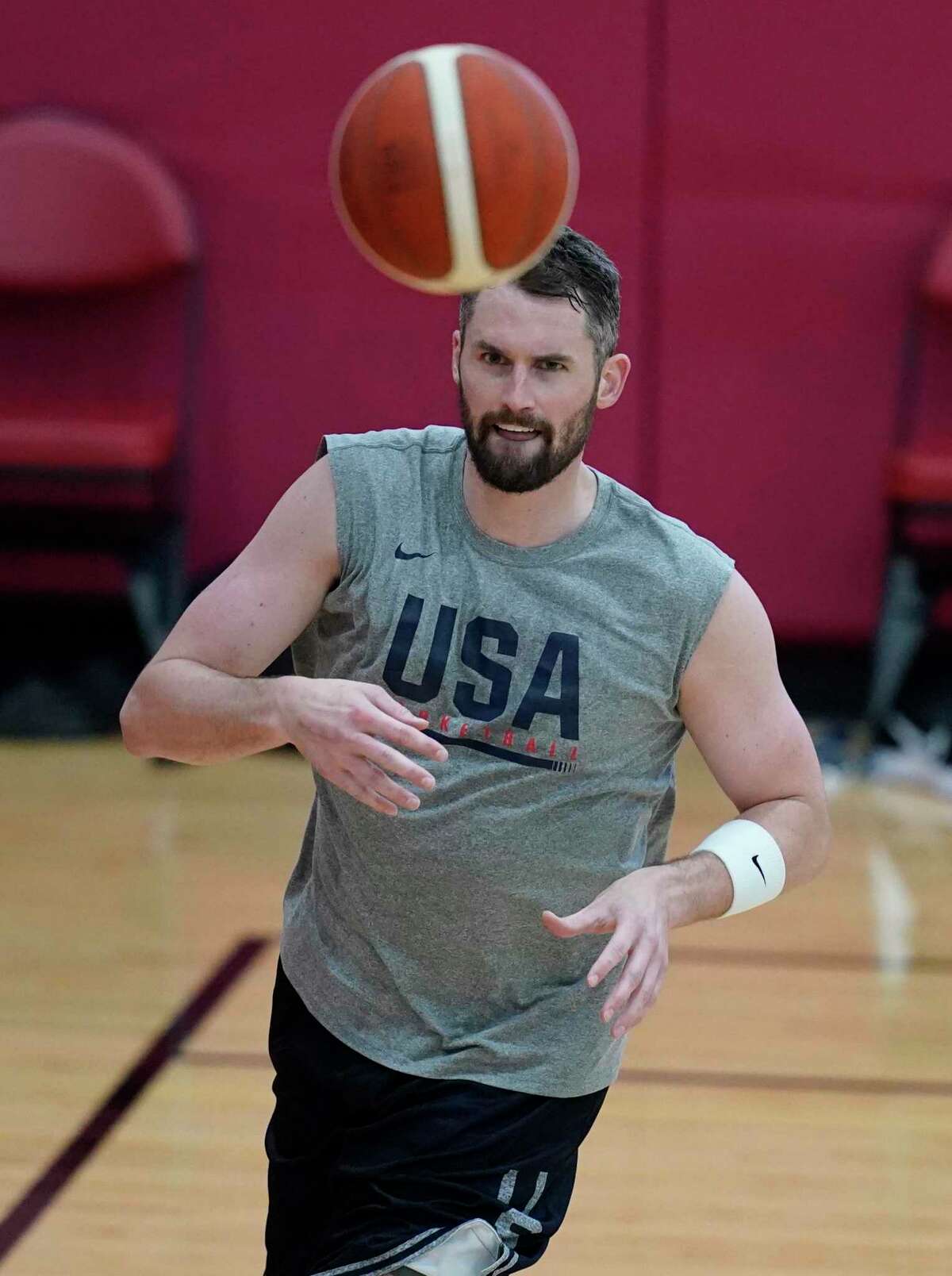 Kevin Love passes during practice for USA Basketball, Wednesday, July 7, 2021, in Las Vegas. (AP Photo/John Locher)