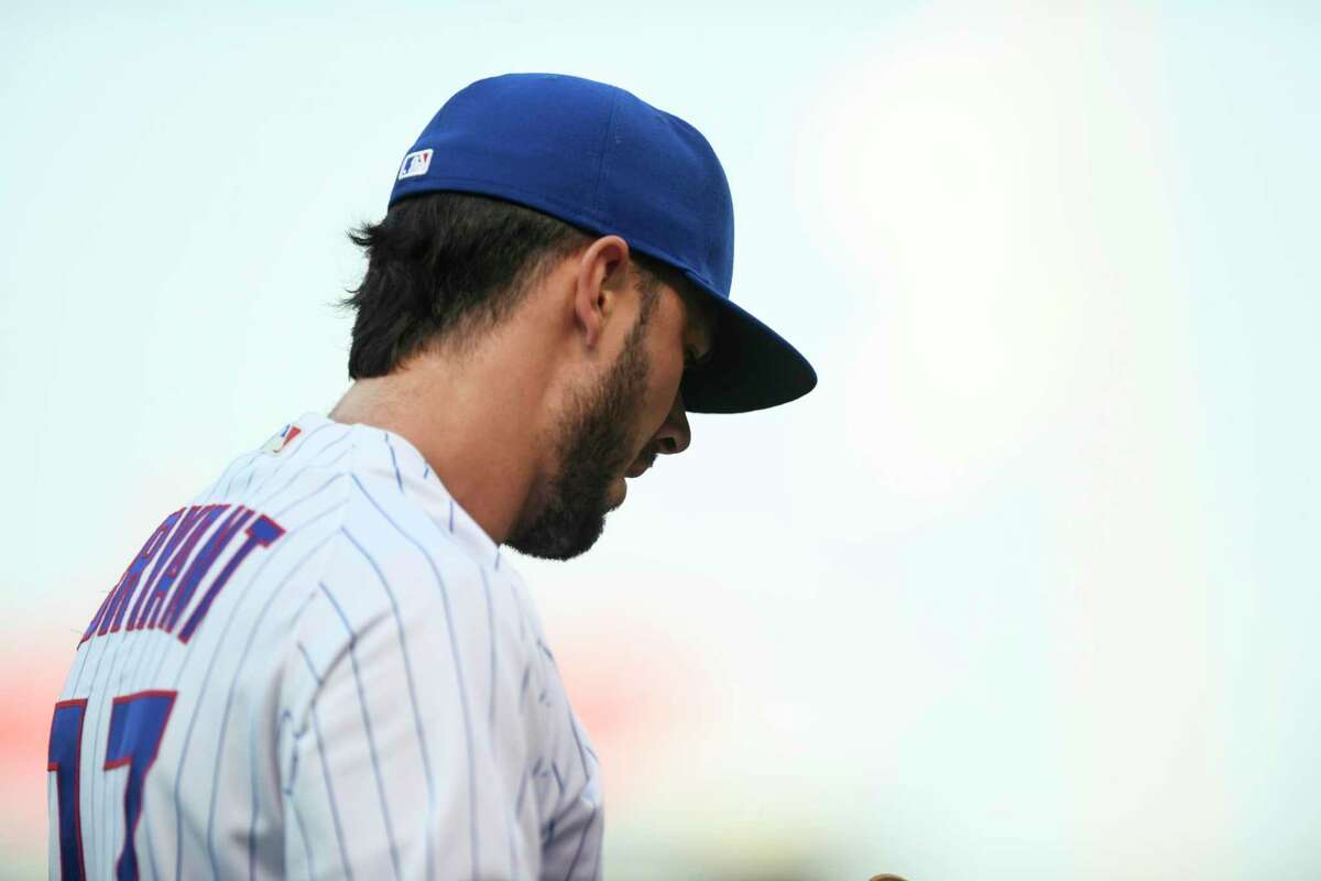Chicago Cubs' Kris Bryant looks on before a baseball game against the Cincinnati Reds Monday, July 26, 2021, in Chicago. Chicago won 6-5. (AP Photo/Paul Beaty)