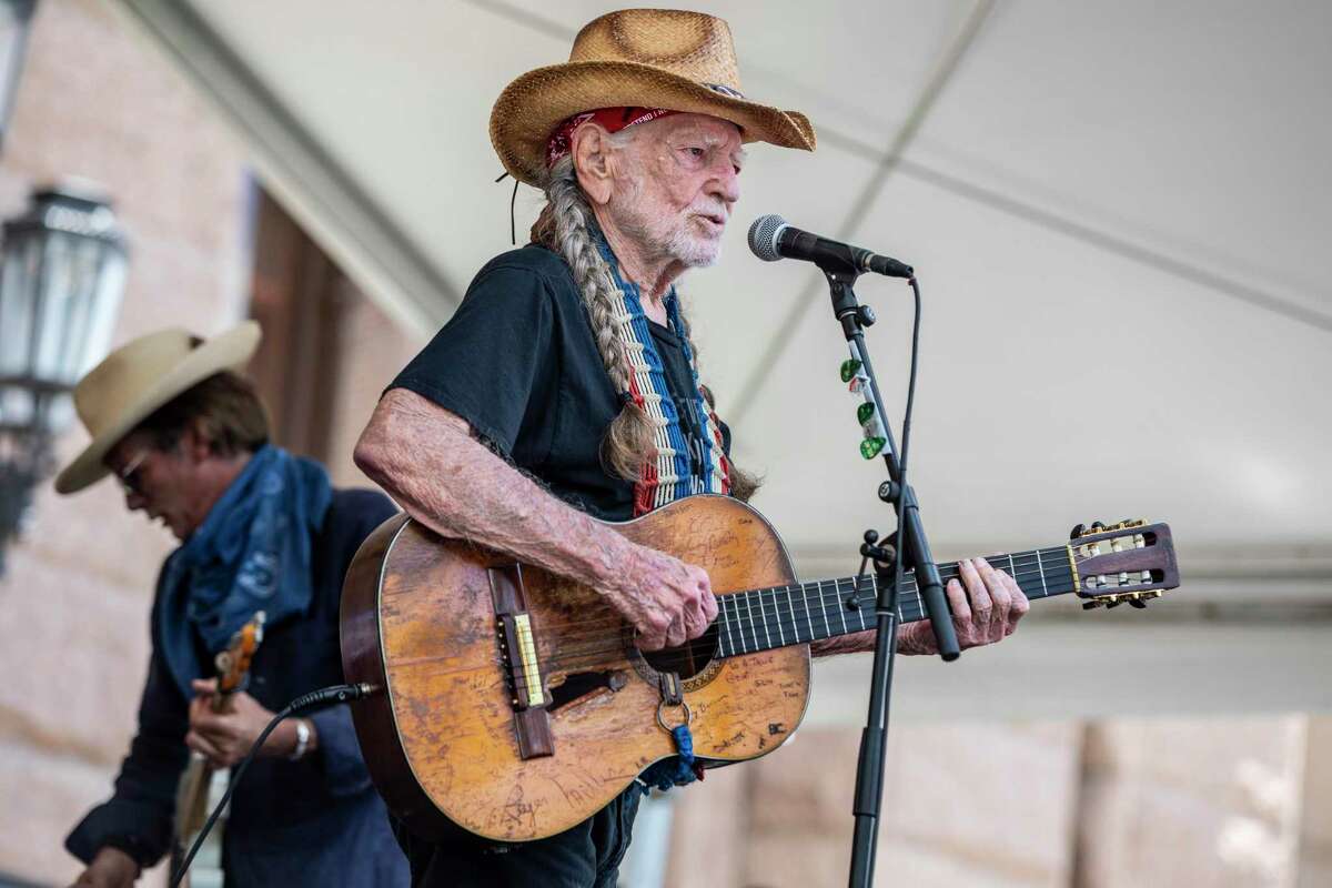 Willie Nelson performs for participants as they rally at the Texas State Capitol in Austin to advocate for voting rights on the final day of a 27-mile, four-day voting rights march to the Capitol on Saturday, July 31, 2021. The Republican-controlled Texas legislature, now in a special session, is poised to pass a number of bills that opponents say would limit access to voting for millions of Texans across the state.
