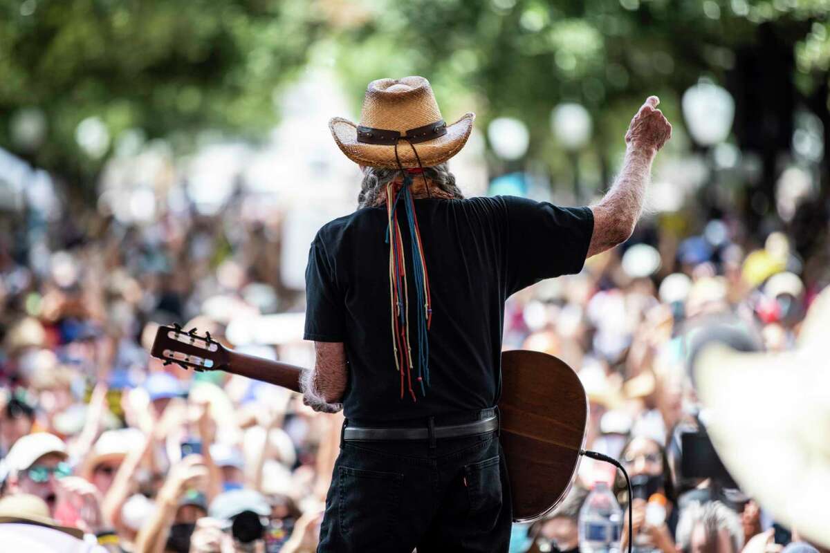 Willie Nelson performs for participants as they rally at the Texas State Capitol in Austin to advocate for voting rights on the final day of a 27-mile, four-day voting rights march to the Capitol on Saturday, July 31, 2021. The Republican-controlled Texas legislature, now in a special session, is poised to pass a number of bills that opponents say would limit access to voting for millions of Texans across the state.