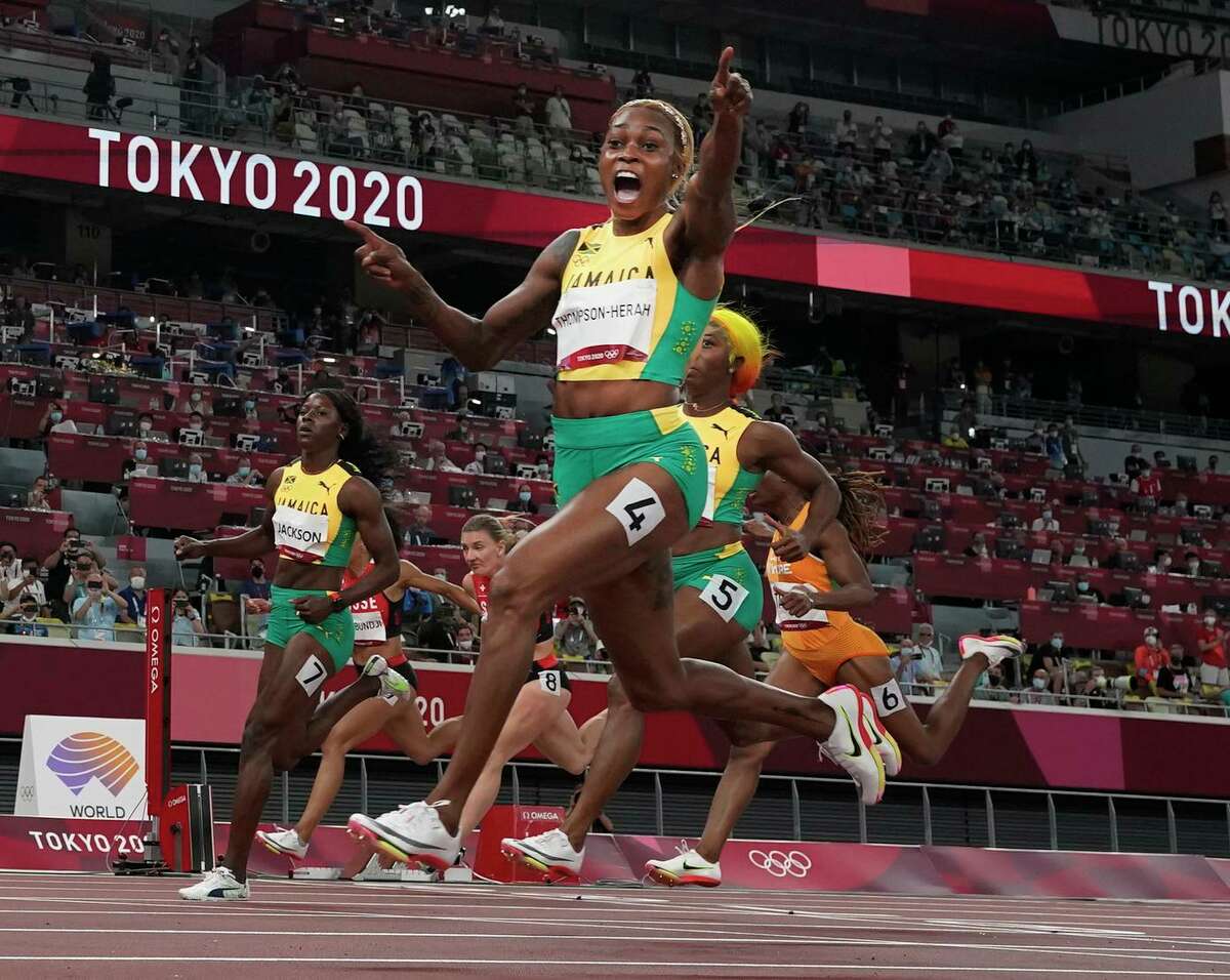 Jamaica’s Elaine Thompson-Herah ran the 100 meters in 10.61 seconds, defending her Olympic title and breaking a 33-year-old Olympic record held by Florence Griffith Joyner.
