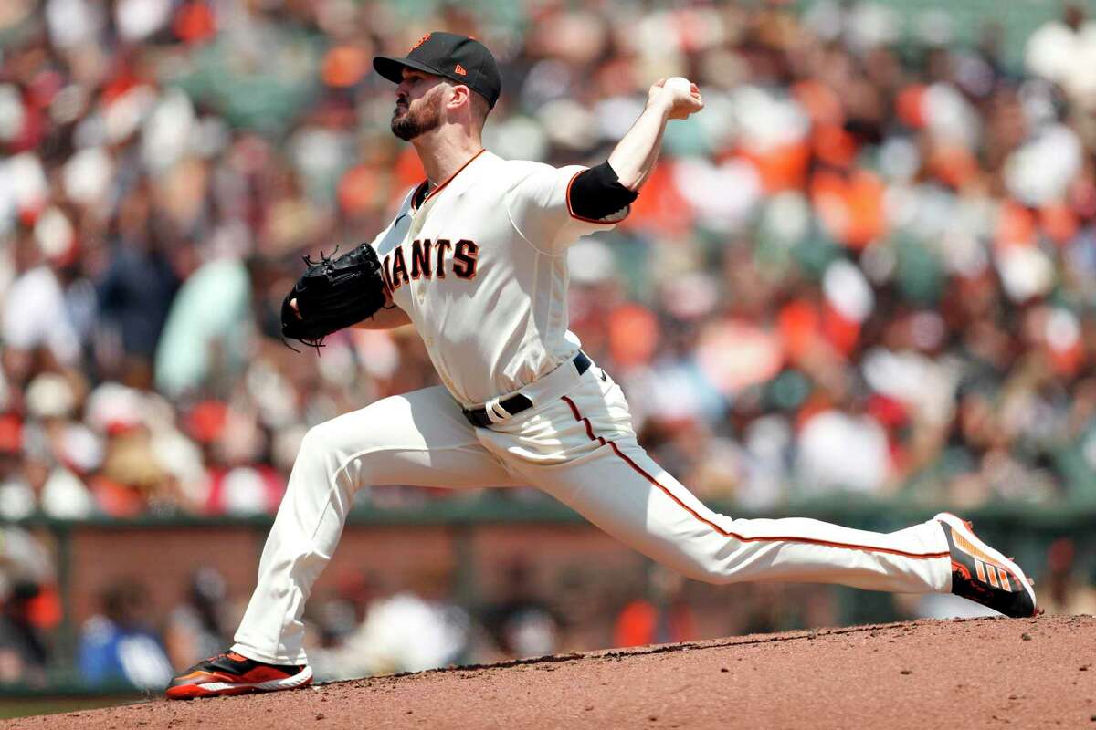San Francisco Giants' Alex Wood pitches against Houston Astros in 1st inning during MLB game at Oracle Park in San Francisco, Calif., on Saturday, July 31, 2021.